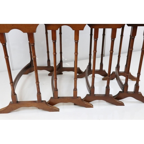 633 - Nest of Four Tables raised on slender faux bamboo legs, largest 59cm wide x 60cm high