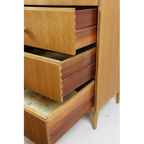 636 - Mid century Retro ' Meredew ' Pale Oak Chest of Six Short Drawers with turned disc handles, 61cm wid... 