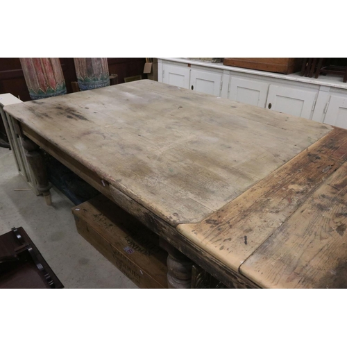 589 - 19th century Oak and Pine Farmhouse Table with a later added pine extension to end, raised on turned... 