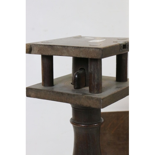 593 - George III Oak Tilt Top Supper Table raised on turned support with three splayed legs (currently in ... 