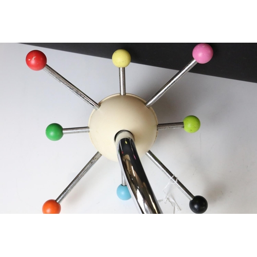 599 - Mid century Retro Hanging Spinning Coat Hooks with eight atomic style ball hooks of various colours,... 