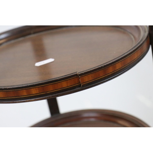 600 - Edwardian Inlaid Mahogany Three Tier Cake Stand with shaped top and three out-swept legs, 95cm high