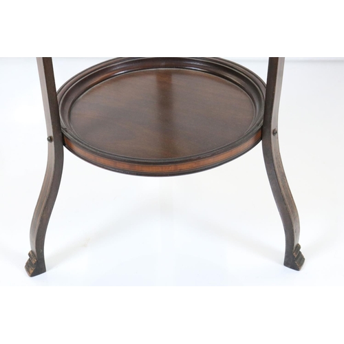 600 - Edwardian Inlaid Mahogany Three Tier Cake Stand with shaped top and three out-swept legs, 95cm high