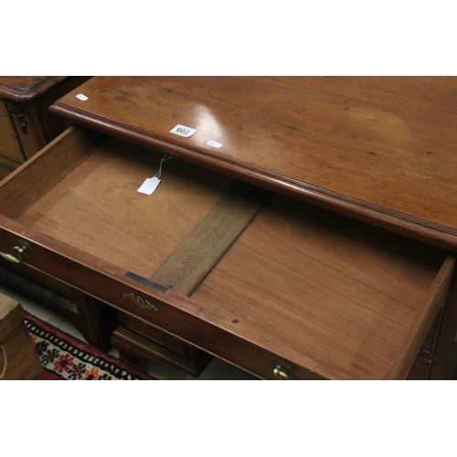 602 - George III style Mahogany Kneehole Desk with an arrangement of seven drawers and central cupboard to... 