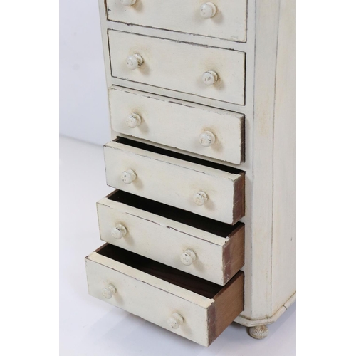 603 - Painted table top bank of six drawers, 28cm wide x 51cm high