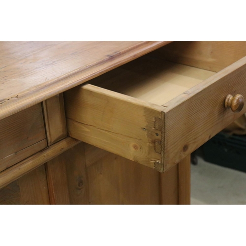 605 - Victorian Pine Dresser Base or Side Cabinet with two drawers over two cupboard doors opening to a sh... 