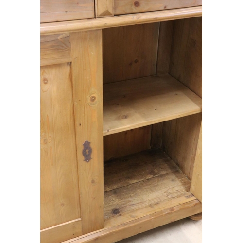 605 - Victorian Pine Dresser Base or Side Cabinet with two drawers over two cupboard doors opening to a sh... 