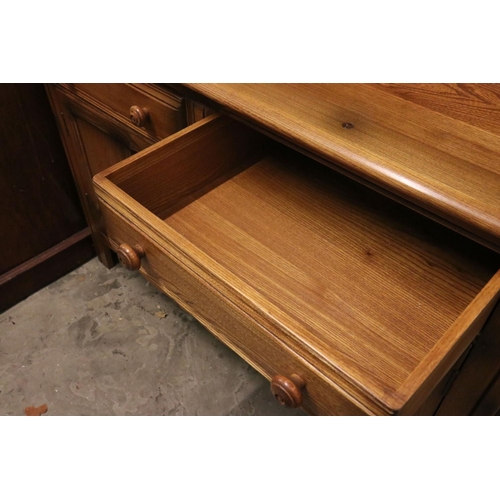 619 - Ercol ' Golden Dawn ' Elm Dresser, the upper section with two plate shelves, over a base with two dr... 