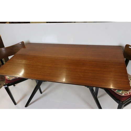 622 - Mid century Retro Teak Rectangular Dining Table raised on black atomic style base, 138cm long x 77cm... 