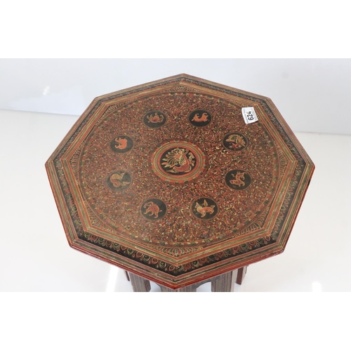 624 - Burmese Red and Black Lacquered Octagonal Folding Table decorated with images of figures, birds, ani... 