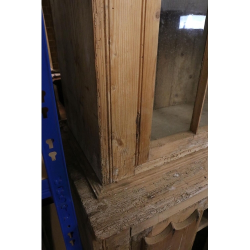 628 - Early 19th century Irish Pine Dresser, with glazed doors to upper section and two cupboard doors to ... 