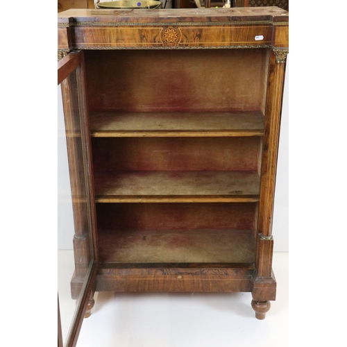 637 - Victorian Walnut Inlaid Pier Display Cabinet with ormolu mounts, the single glazed door opening to t... 