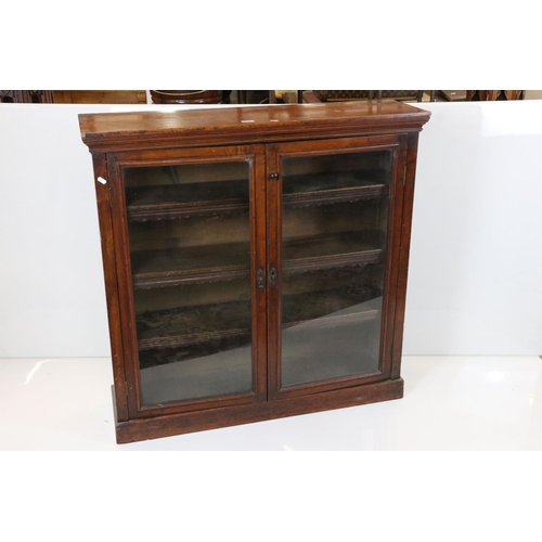 639 - Victorian Mahogany Display Cabinet, the twin glazed doors opening to three adjustable shelves with l... 