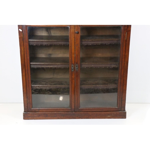 639 - Victorian Mahogany Display Cabinet, the twin glazed doors opening to three adjustable shelves with l... 