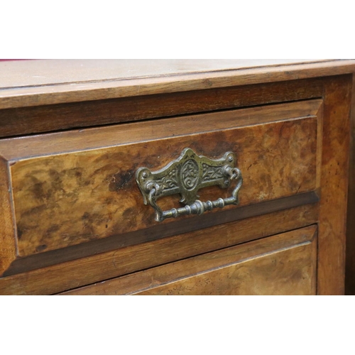 646 - Pair of Victorian walnut four drawer chests, each 39cm wide x 75cm high