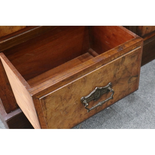 646 - Pair of Victorian walnut four drawer chests, each 39cm wide x 75cm high
