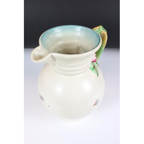 18 - Clarice Cliff Moulded Jug, shape no. 895 decorated in the ' My Garden ' pattern, 23cm high