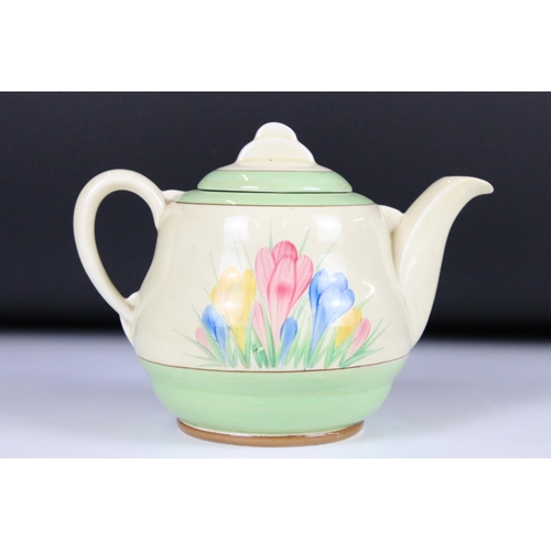 7 - Clarice Cliff for Newport Pottery ' Spring Crocus ' Teapot and Cover, 14cm high together with Claric... 