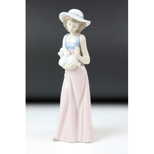 54 - Four Nao Porcelain Figures including Girl holding a Dog, Girl holding a sheath of wheat, 31cm high O... 