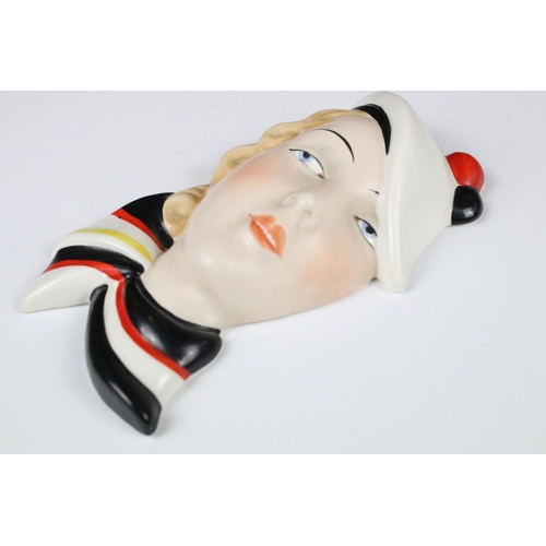 56 - Royal Dux Porcelain Face Mask in the form of an Art Deco Lady wearing a beret and scarf, stamped Roy... 