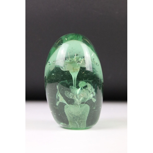 68 - Victorian Green Glass Dump with Flower in a Pot inclusion, 12cm high, a Victorian Blue Glass Squat D... 