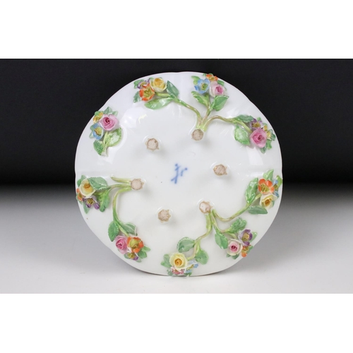 76 - Meissen floral encrusted cup and saucer, decorated with insects and flowers