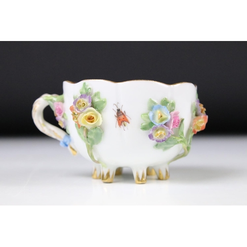 76 - Meissen floral encrusted cup and saucer, decorated with insects and flowers