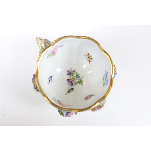 76 - Meissen floral encrusted cup and saucer, decorated with insects and flowers