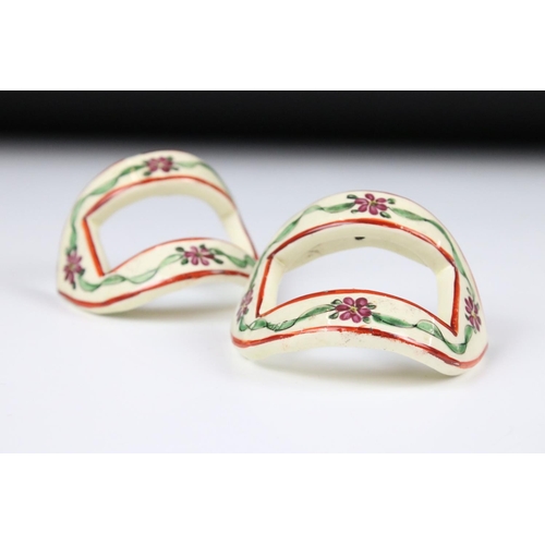78 - Pair of 19th century English creamware pattern shoe buckles decorated with garlands of flowers, one ... 