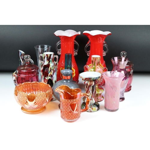 109 - A collection of glassware, to include: a pair of Victorian Cranberry glass jars and covers, a pair o... 