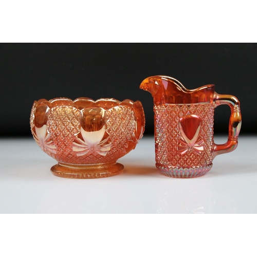 109 - A collection of glassware, to include: a pair of Victorian Cranberry glass jars and covers, a pair o... 