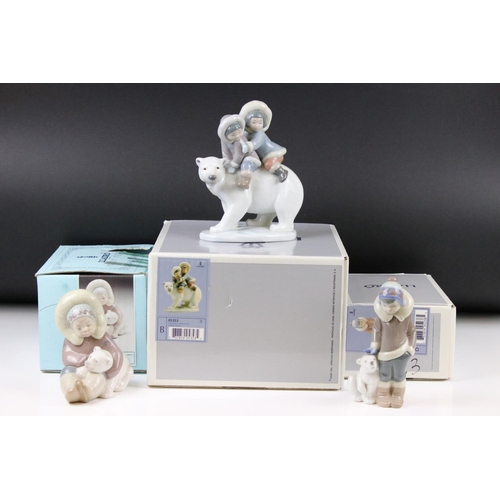 86 - Three Lladro figures, comprising: 1195 'Eskimo Playing, 5238 'Eskimo Boy with Pet' and 5353 'Eskimo ... 