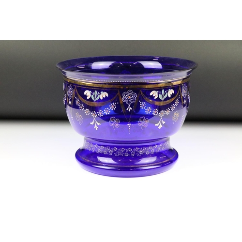 88 - Blue Glass Bowl with hand painted enamel and gilded floral decoration, 27cm diameter x 20cm high