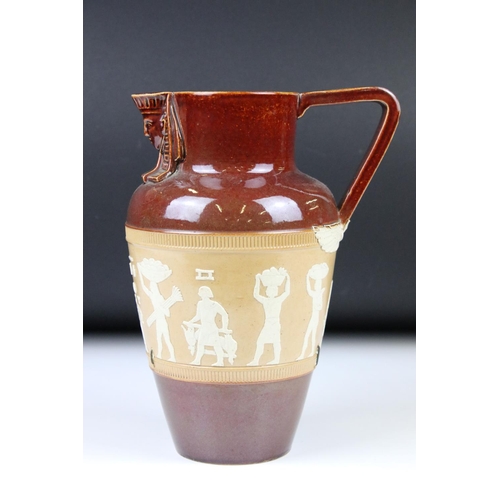 90 - A Doulton Lambeth salt glazed stoneware Egyptian revival style jug, 21cm high, a Victorian jardinièr... 