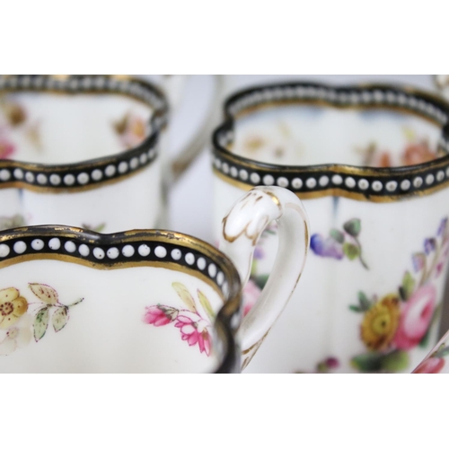 98 - A Coalport part tea and coffee service of quatrefoil design, printed and painted with floral sprays,... 