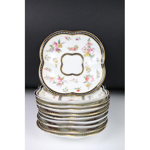 98 - A Coalport part tea and coffee service of quatrefoil design, printed and painted with floral sprays,... 