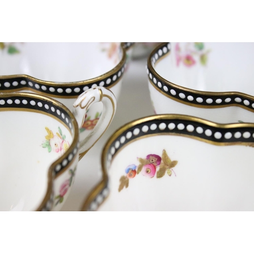 98 - A Coalport part tea and coffee service of quatrefoil design, printed and painted with floral sprays,... 