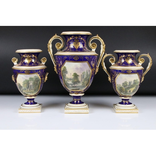 110 - Crown Derby porcelain garniture, the larger twin handled urn decorated with a ' View of Derby, ' the... 