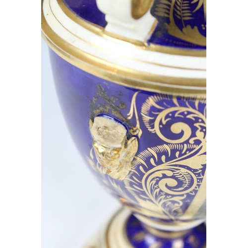 110 - Crown Derby porcelain garniture, the larger twin handled urn decorated with a ' View of Derby, ' the... 