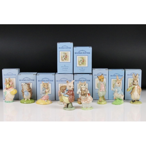 114 - Nine Royal Doulton John Beswick Beatrix Potter figures, comprising: 'Mrs Rabbit', 'Timmy Willie Fetc... 