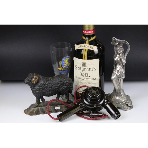 316 - A small group of mixed collectables to include a cast iron door stop in the form of a ram and a mid ... 