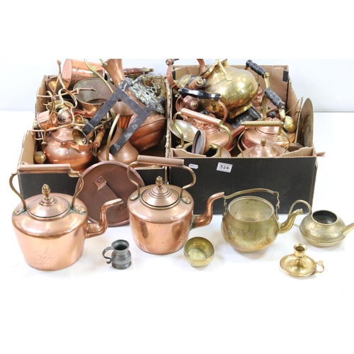 326 - A large collection of mixed brass and copper ware to include teapots, trivets, jugs, pots and plates... 