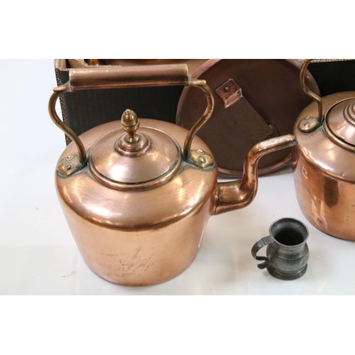 326 - A large collection of mixed brass and copper ware to include teapots, trivets, jugs, pots and plates... 