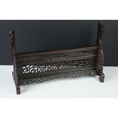 135 - Chinese Pierced Hardwood Table Screen with a Carved Stone Central Panel depicting Dragons, 33cm high... 