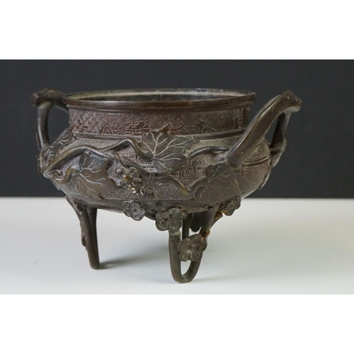 139 - Chinese bronze censer, with impressed square seal mark, applied with grapes and vines, lacking cover... 