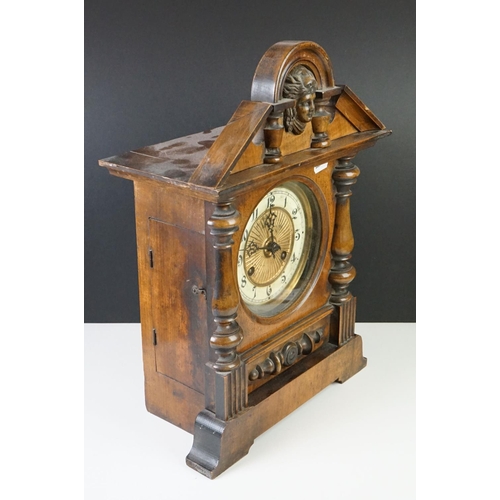 140 - Early 20th century Walnut Mantle Clock, 8 day, the white enamel and gilt face with Arabic numerals, ... 