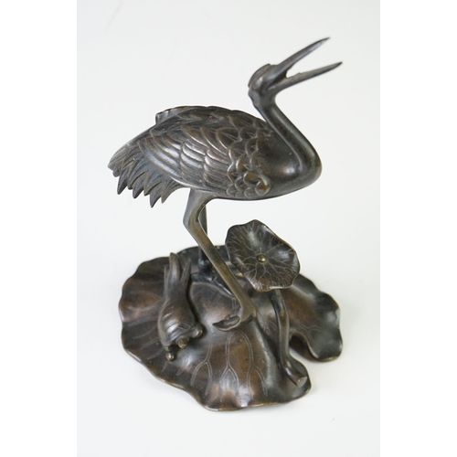 142 - Pair of 19th century bronze groups of a crane standing on a lily pad with a turtle, repaired, approx... 