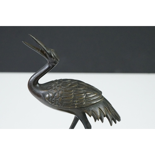 142 - Pair of 19th century bronze groups of a crane standing on a lily pad with a turtle, repaired, approx... 