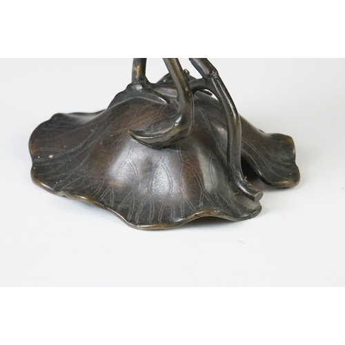 142 - Pair of 19th century bronze groups of a crane standing on a lily pad with a turtle, repaired, approx... 