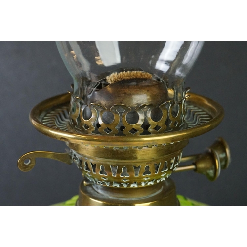 144 - Victorian Oil Lamp with opaque moulded green glass well, brass column support and black socle base, ... 